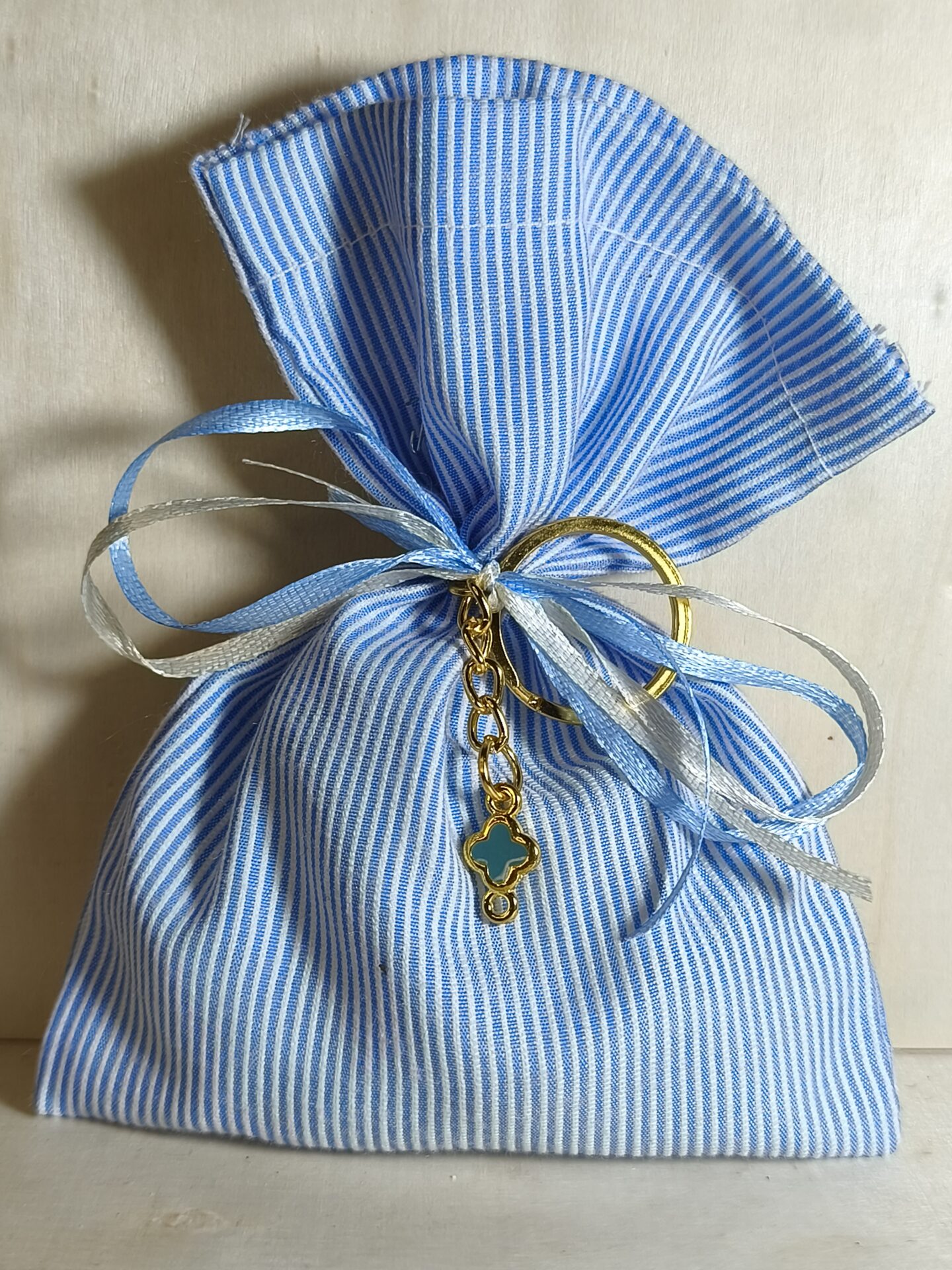 Mπομπονιερα Βαπτισης Πουγκι Ριγε+Σταυρος Μπρελοκ