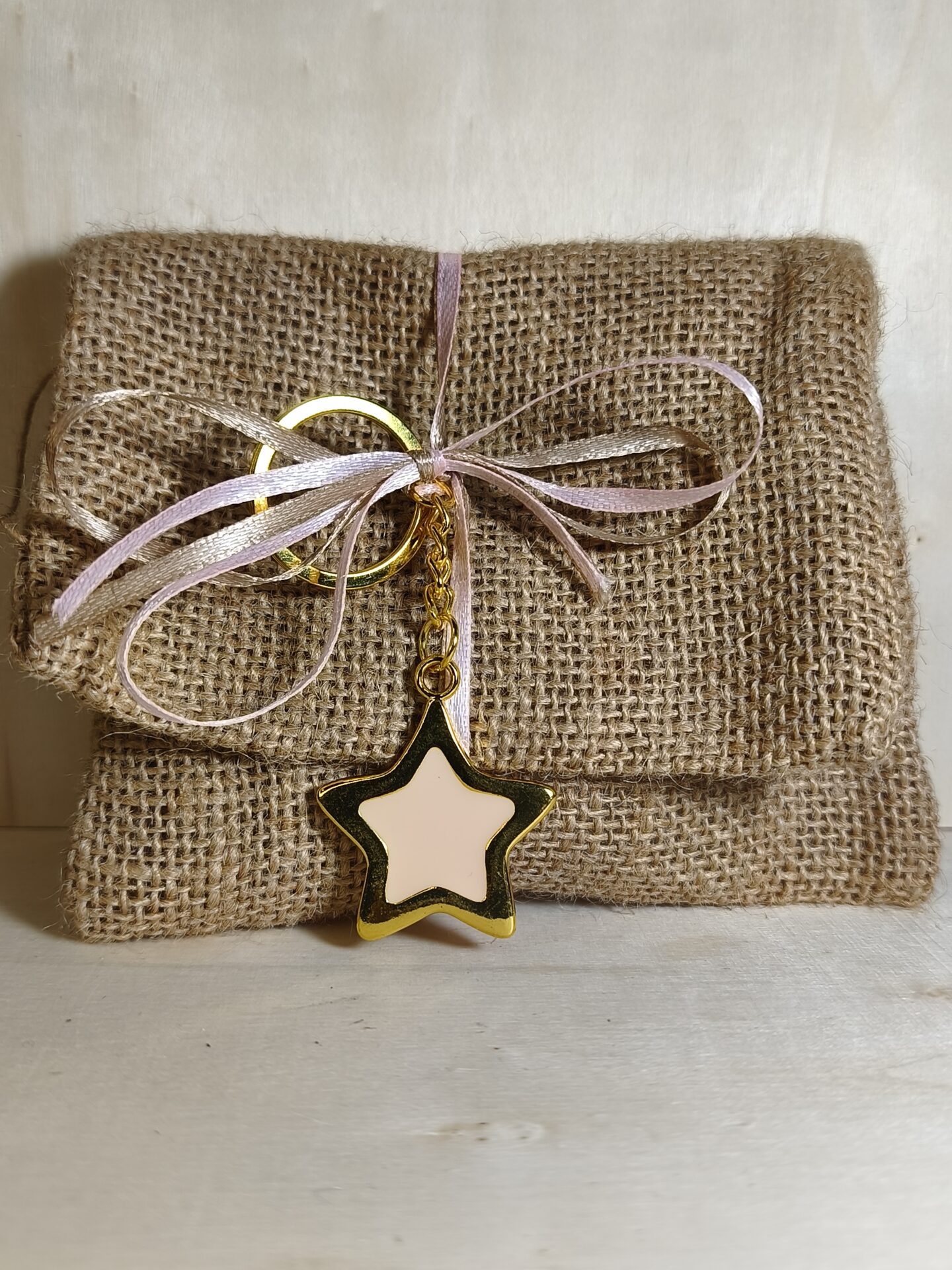 Mπομπονιερα Βαπτισης Πουγκι Λινατσα+Αστερακι+Πατουσακια Μπρελοκ