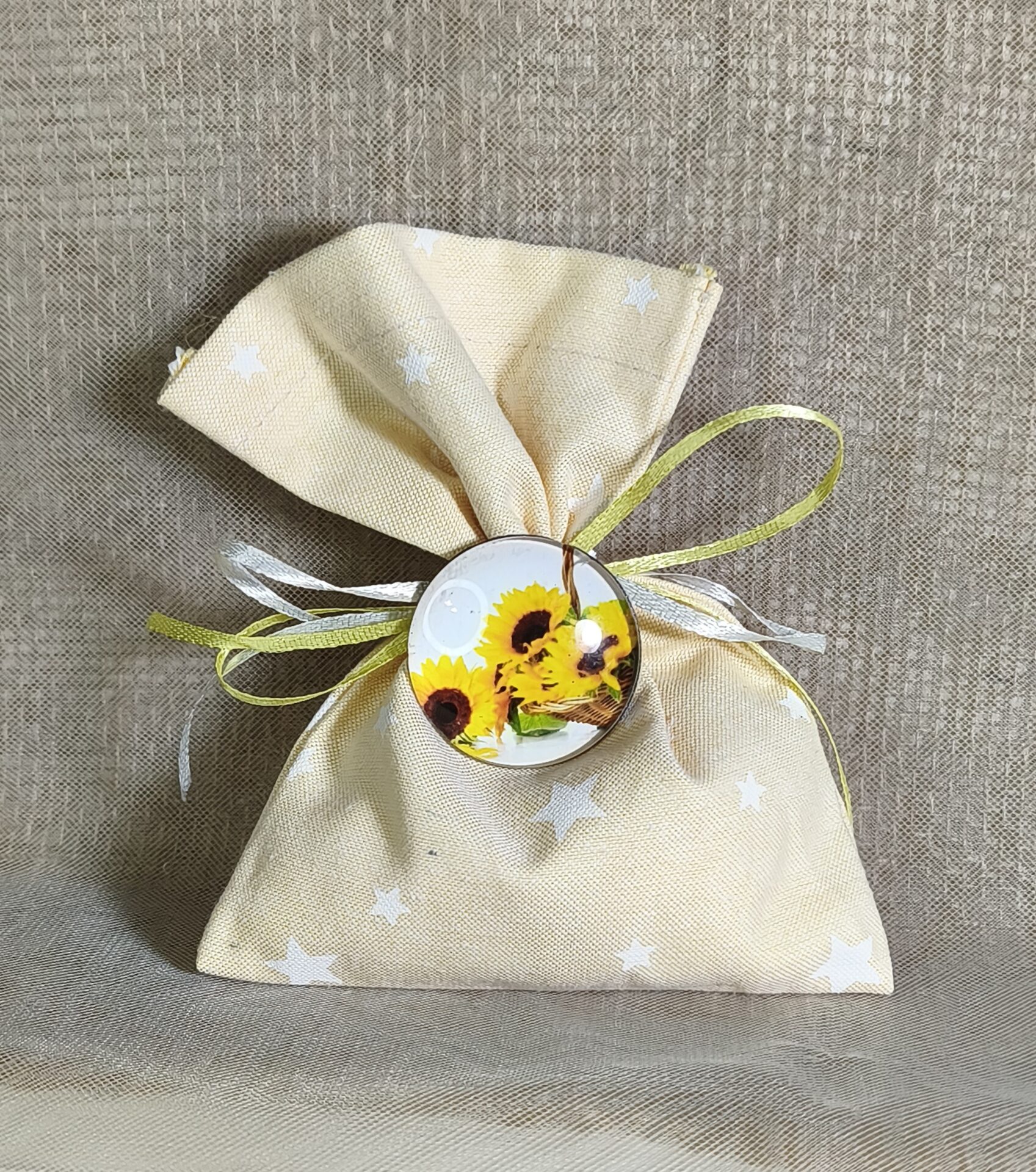 Mπομπονιερα Βαπτισης Πουγκι Αστερι+Ηλιανθος Μαγνητακι